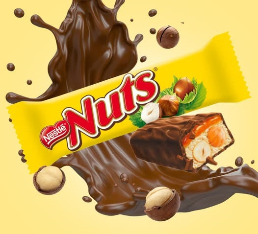 Шоколадный батончик с орехами Nuts king  Nestles 66g/24ps